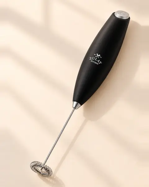 Black Zulay Kitchen handheld milk frother with a stainless steel whisk