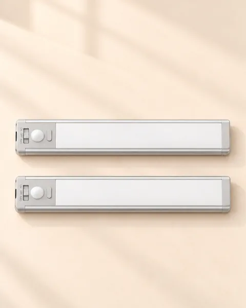 Two motion sensor LED bars side by side, showing the ON, OFF and AUTO switch